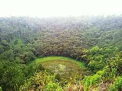 A deep dormant crater volcano