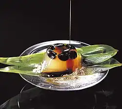 a translucent jelly with black soybeans visible inside