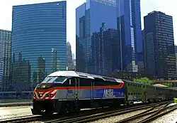 MP36 #418 leads a train out of Union Station in Chicago.