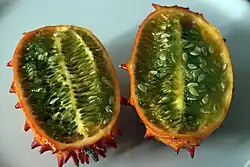 Fruit in cross section showing green flesh