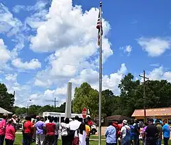 Kentwood residents observe a noontide Day of Prayer in front of the Town Hall in 2015