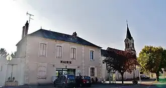 The town hall and church in Marseilles-lès-Aubigny