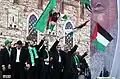 Haniyeh with Khaled Mashal celebrating the 25th anniversary of the Hamas movement in 2012