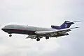 A United Boeing 727 in the "Battleship" paint-job used from 1993 to 1997.