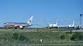 Airplanes taxiing to the runway