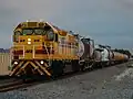 No. LQ3121 Shoalhaven (formerly 265) passing Thornlie with a cement train in 2009.