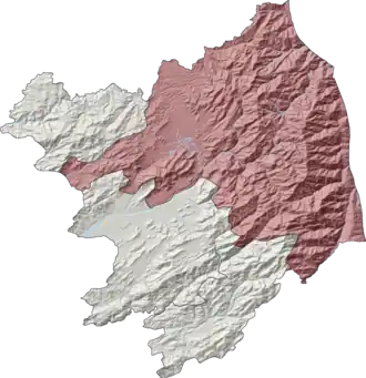 Map of Abbottabad District, Abbottabad Tehsil is shown in red
