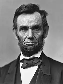 Portrait of a bearded Abraham Lincoln showing his head and shoulders