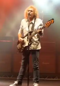 Alan Lancaster performing with Status Quo in Manchester, 2013