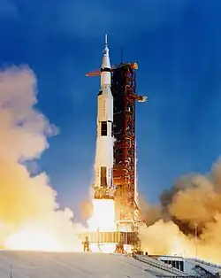 The Saturn V rocket carrying the Apollo 11's three people into space.