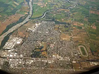 Aerial view of Ashburton, looking west. The Ashburton River/Hakatere is visible at left.