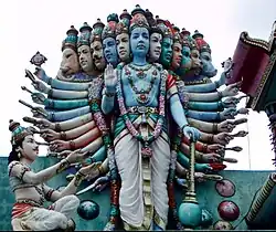 Vishnu as Krishna reveals his true form to Arjuna