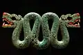 Aztec carving of a snake, made in wood and covered with turquoise