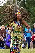 Aztec culture continues today.  This woman is doing a fire dance in Aztec clothing