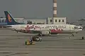 A Hainan Boeing 737-400 in the old paint-job.