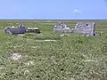 Settlement remains, radio tower in background