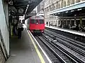 Barbican station, with a Circle Line train