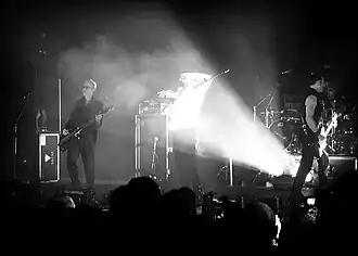 Bauhaus performing live in London in 2006. Left to right: David J, Peter Murphy and Daniel Ash