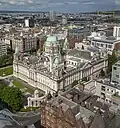 All of the buildings in this picture of Belfast in Ireland are rectangular to fit together, with some spaces for alleyways.