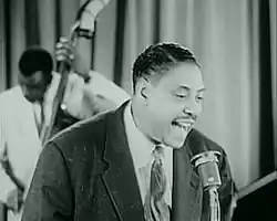 Big Joe Turner singing at the Apollo Theatre in 1955