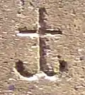 Kya (vertical assembly of consonants "Ka"  and "Ya" ), as in "Sa-kya-mu-nī " ( 𑀲𑀓𑁆𑀬𑀫𑀼𑀦𑀻, "Sage of the Shakyas")