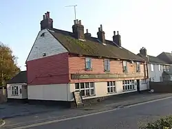 Town nestling at the foot of rolling hills