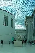 The Great Court of the British Museum in London has a glass roof.