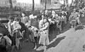 Soviet Jewish women and children being forced out of their homes