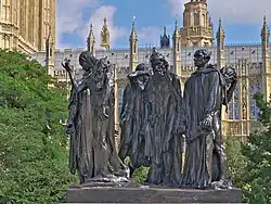 The Burghers of Calais in Westminster, London. The statue commemorates six merchants of Calais who offered themselves as hostages to Edward III after he had besieged their town for nearly a year in 1347.
