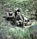 A Canadian mortar team fighting in France, 1944.