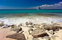 Cruise liner in Catalina Island, La Romana, approaching the rocky landscape.