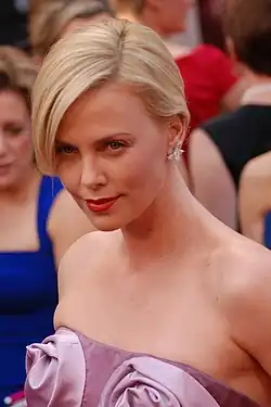 A photograph of Theron on the red carpet at the 82d Academy Awards in 2010