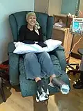 A cancer victim in a head scarf after losing her hair due to Chemotherapy.