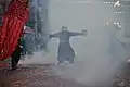 The parade and a cloud of smoke from firecrackers in DC (2015)