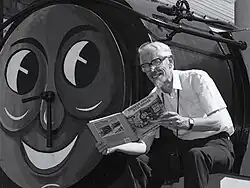 Christopher Awdry reading one of his books in 1987.