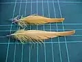 Citron-crested Cockatoo crest feathers (on 1&nbsp;cm grid)
