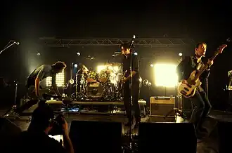 Deus performing at Rolling Stone in Milan: Tom Barman, Stéphane Misseghers, Mauro Pawlowski and Alan Gevaert
