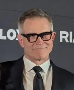 A picture of David Baszucki in a suit cropped