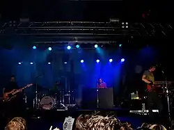 Death Cab for Cutie performing "Summer Skin" on their "Long Division" European tour, at Carling Academy Sheffield on November 17, 2008. Left to right: Harmer, McGerr, Gibbard, Walla.