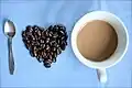 A rebus is a kind of word puzzle which uses pictures to represent words, such as "T,4,2" instead of "tea for two". This rebus-like symbolic image says: "I love coffee". Rebuses played a role in creation of alphabets.