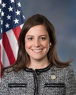 Official portrait of Elise Stefanik. She is a middle-aged woman with dark hair.