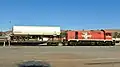 No. 104 shunting intermodal wagons at Alice Springs in 2015.