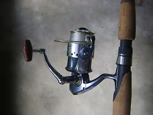 An open faced spinning reel