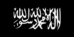 The jihadist flag: a plain black flag with the Shahada on it in white calligraphic Arabic text