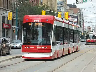 A large red streetcar