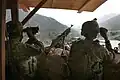 A GPMG on a tripod.