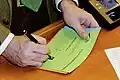 A ballot paper, where people have two options (they can vote for either, but not for both)