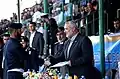 Ismail Haniyeh shaking hands with a Hamas police officer in 2012