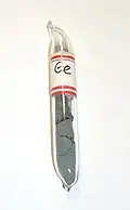 Germanium in a tube. Germanium can be used to make semiconductors. Silicon is used more.