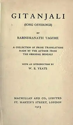 Close-up of a yellowed title page in an old book: "Gitanjali (Song Offerings) by Rabindranath Tagore. A collection of prose translations made by the author from the original Bengali with an introduction by W. B. Yeats. Macmillan and Co., Limited, St. Martin's Street, London, 1913."